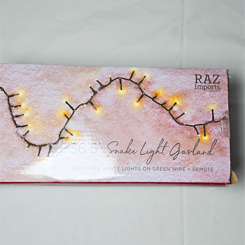 RAZ Imports 36.5' Snake Light Garland 500 Warm White LED, Remote, Green Cord